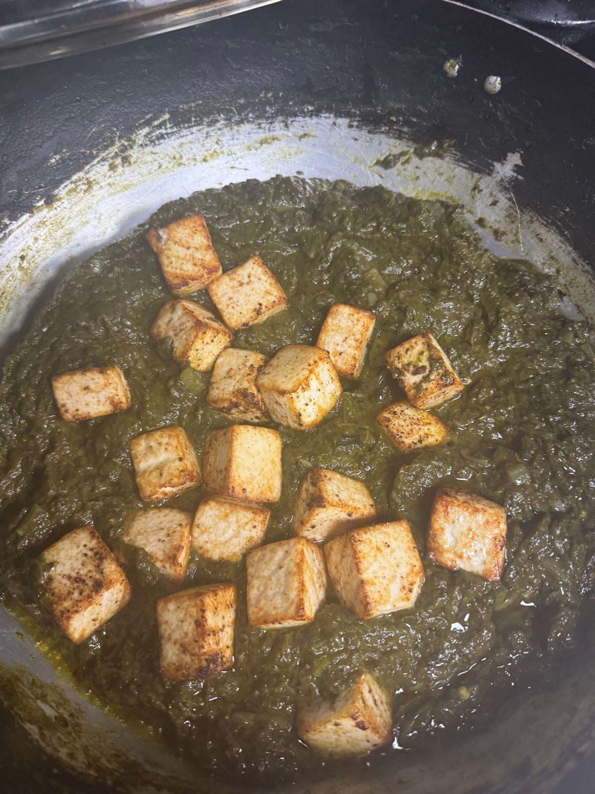 Saag paneer cooked fresh in the pan